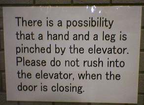 ...a hand and a leg is pinched by the elevator....